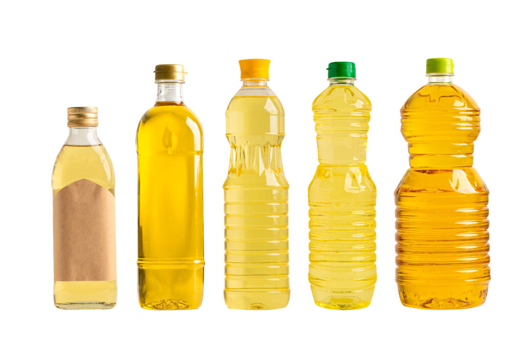 Vegetable Oil With Olive Oil In Different Bottle